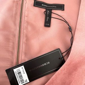 Bcbgmaxazria top in size XXS, color RoseDawn with back zipper.